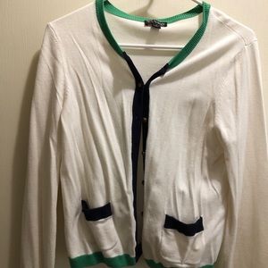 White cardigan with green and blue accents